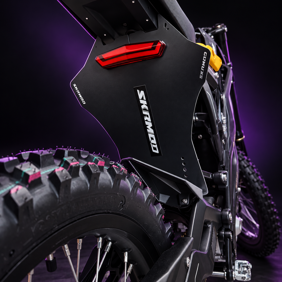 79BIKE Falcon wider rear shock mudguard installed under the seat, black and purple studio render